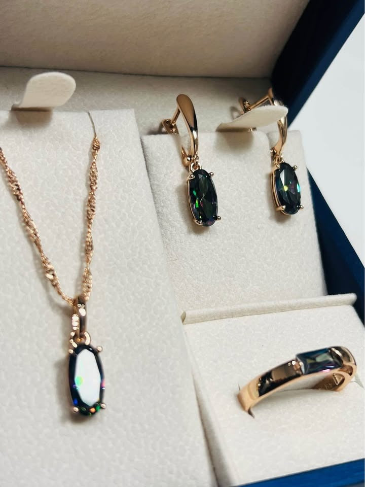 Stunning mystic topaz necklace, earrings, and ring set in 14k rose gold, ready for gifting.