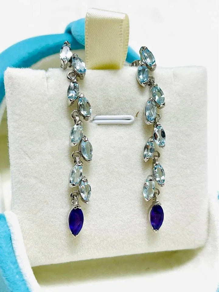 Pair of natural aquamarine and deep purple amethyst drop earrings with a fluid, multi-stone design.