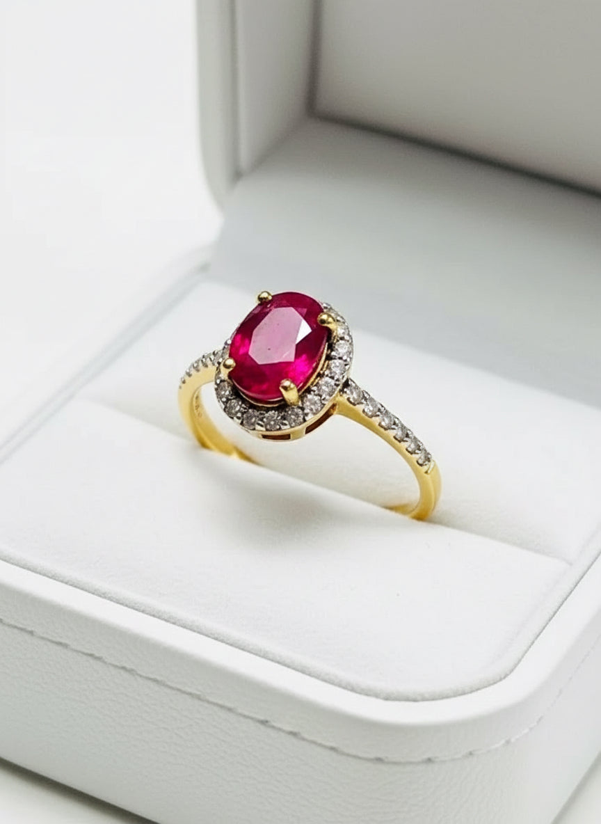 Angled view of a natural ruby and natural diamond ring, nestled in a wooden heart box.