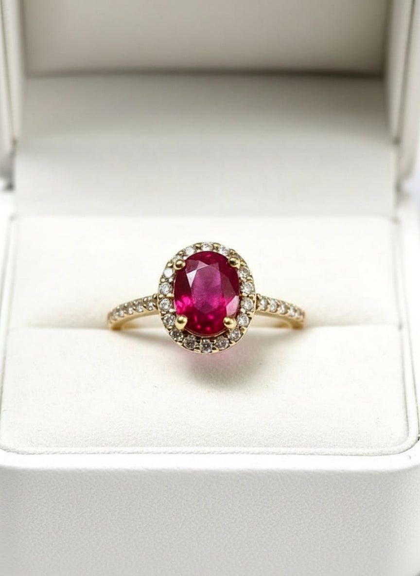 Exquisite natural ruby and natural diamond halo ring in a heart-shaped wooden box.