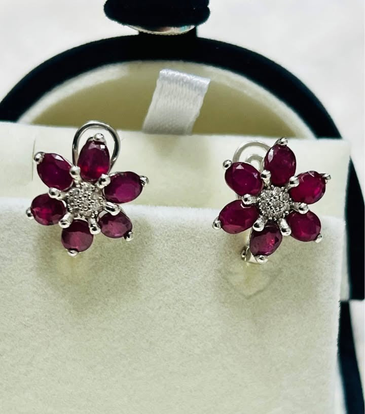 Exquisite flower earrings with natural rubies and white sapphires, sterling silver setting.