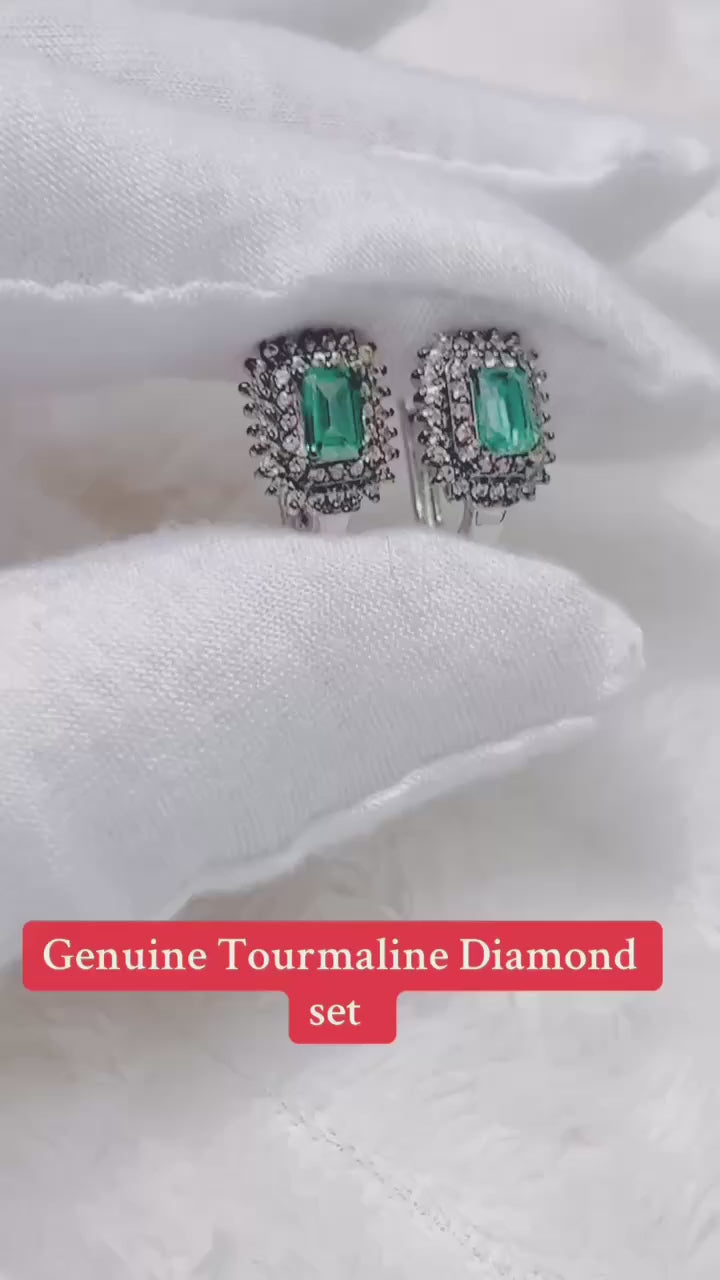 Genuine green tourmaline and diamond matching jewelry set.