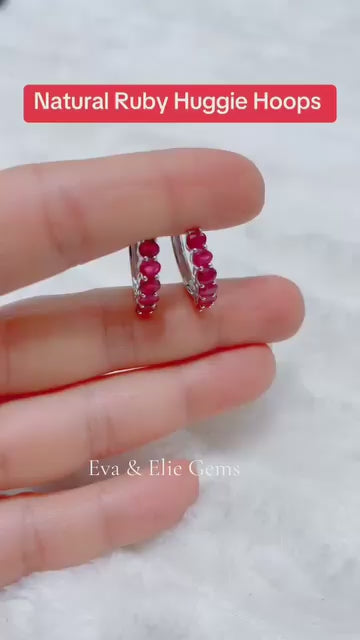 Natural ruby huggie hoop earrings in sterling silver.