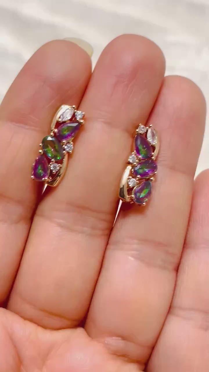 Marquise-cut mystic topaz stud earrings in gold-toned setting.