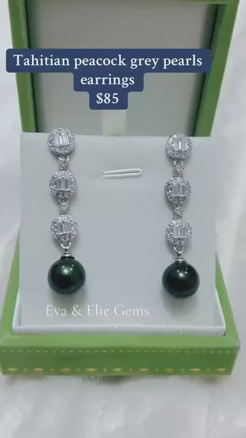 Sterling silver drop earrings with elegant peacock grey Tahitian pearls.