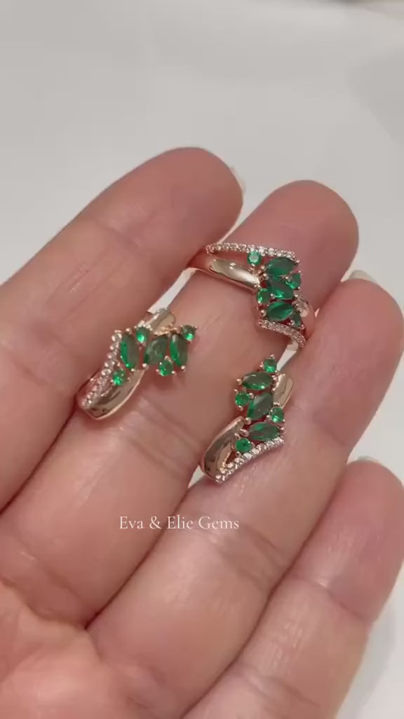 Elegant 14k rolled gold set with a ring and earrings, each showcasing a green gemstone and white accents.