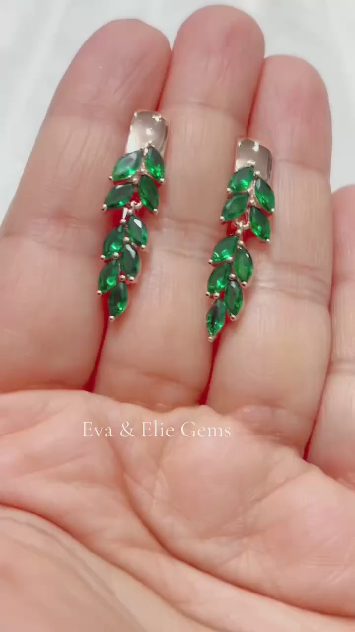  Beautiful 14k gold-filled dangle earrings featuring natural green topaz.