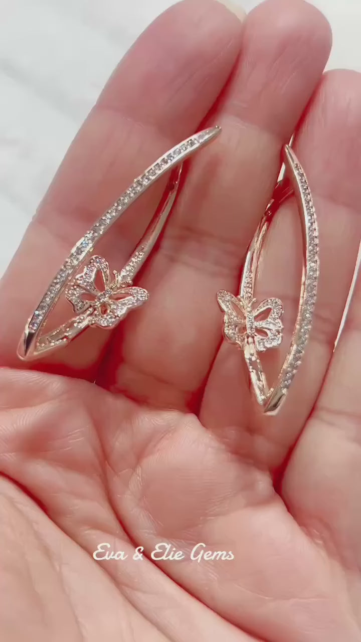 Enchanting butterfly design earrings with delicate sparkle, perfect for everyday elegance.