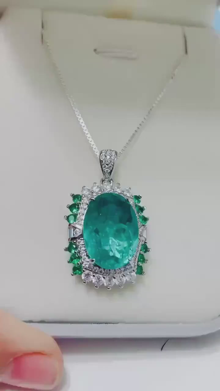 Dazzling lab-created Beon Emerald pendant necklace in Italian sterling silver. Elegant green jewel.
