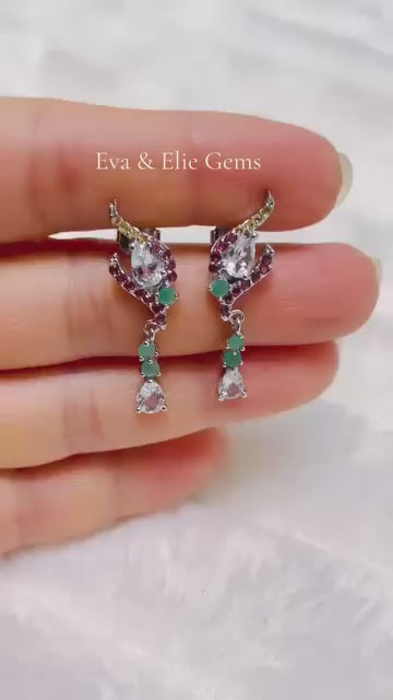 Sterling silver earrings featuring natural aquamarine, emerald, and garnet.