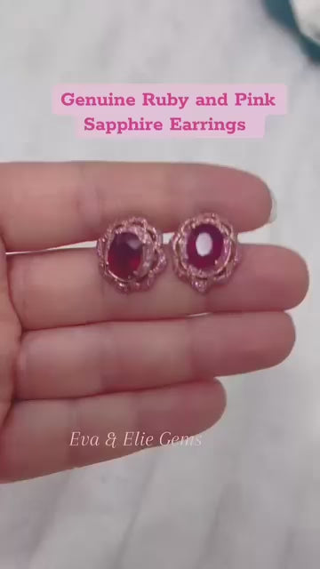 Luxurious rose gold-toned earrings featuring dazzling ruby and pink sapphire gems.