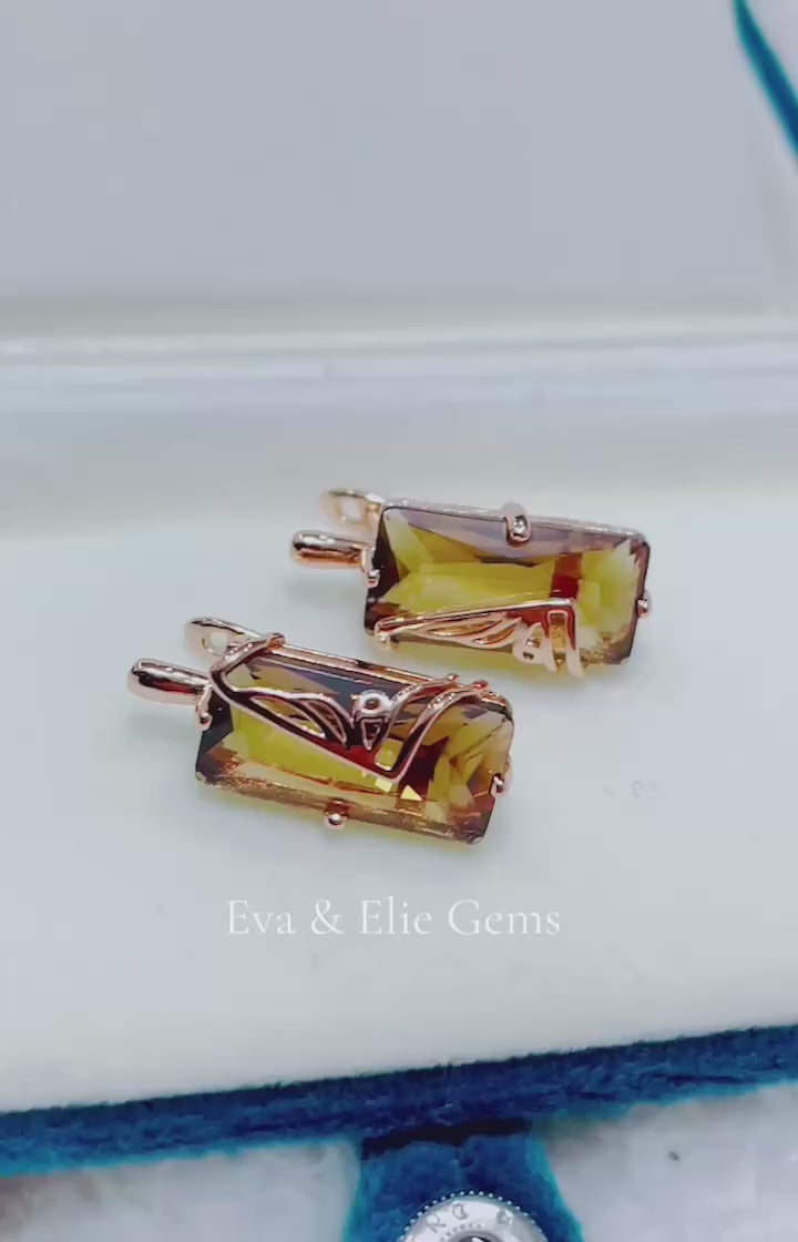 Elegant and unique earrings with a striking rectangle citrine gemstone in 14k rolled gold.