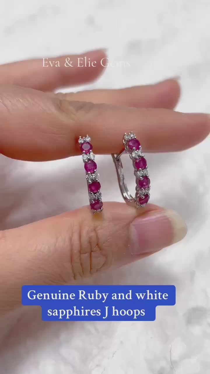 Dazzling pink ruby and white sapphire sterling silver hoop earrings.