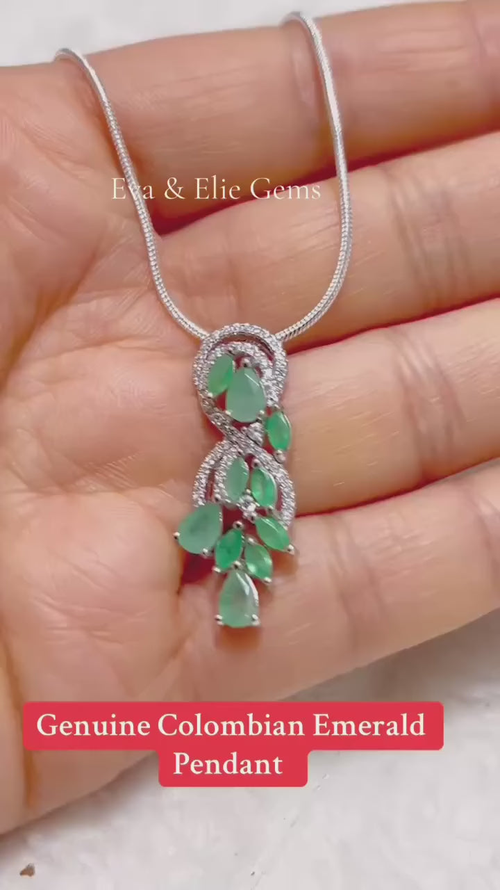 Genuine Colombian emerald pendant necklace with sparkling accents.