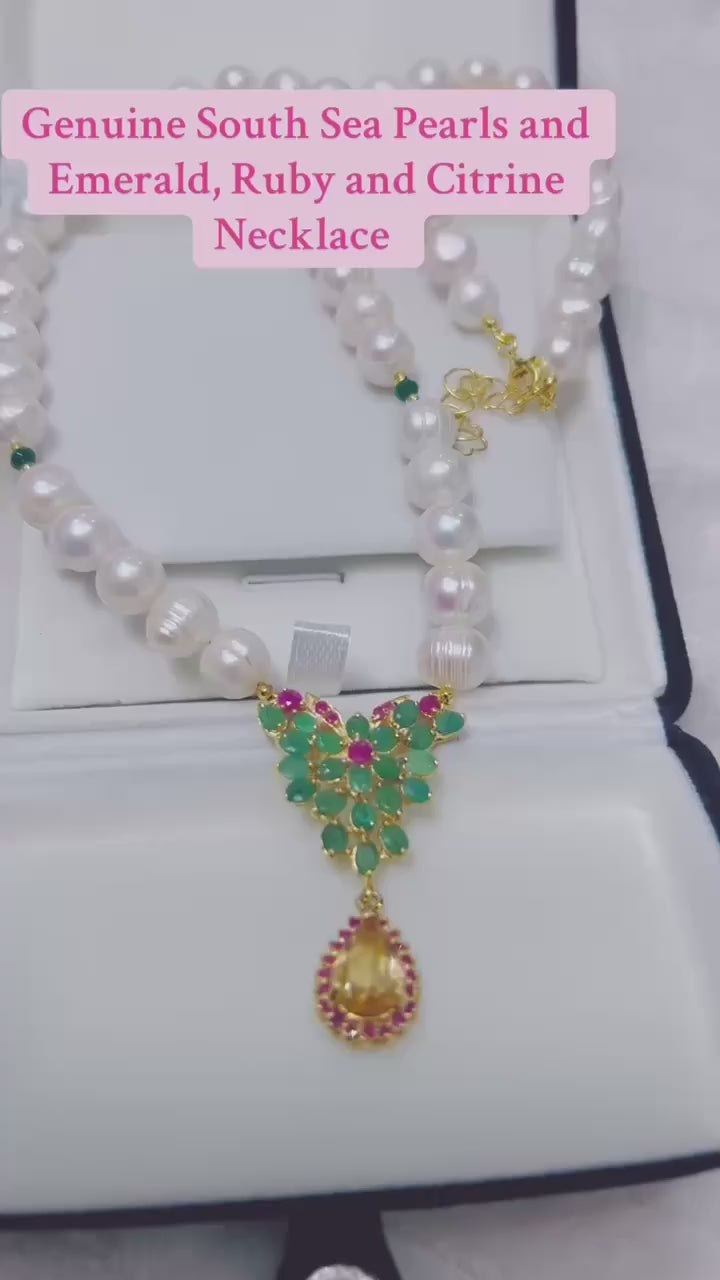 Genuine South Sea pearl necklace with emerald, ruby, and citrine accents.