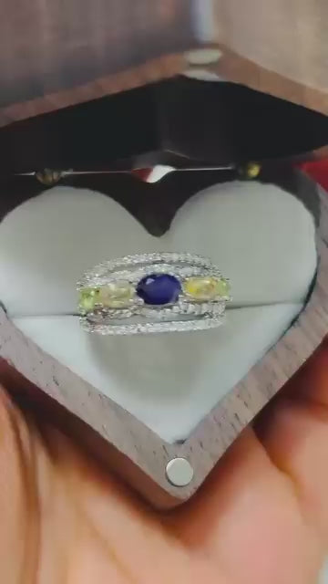 Natural amethyst, peridot, & citrine ring with vibrant multi-gemstone design.