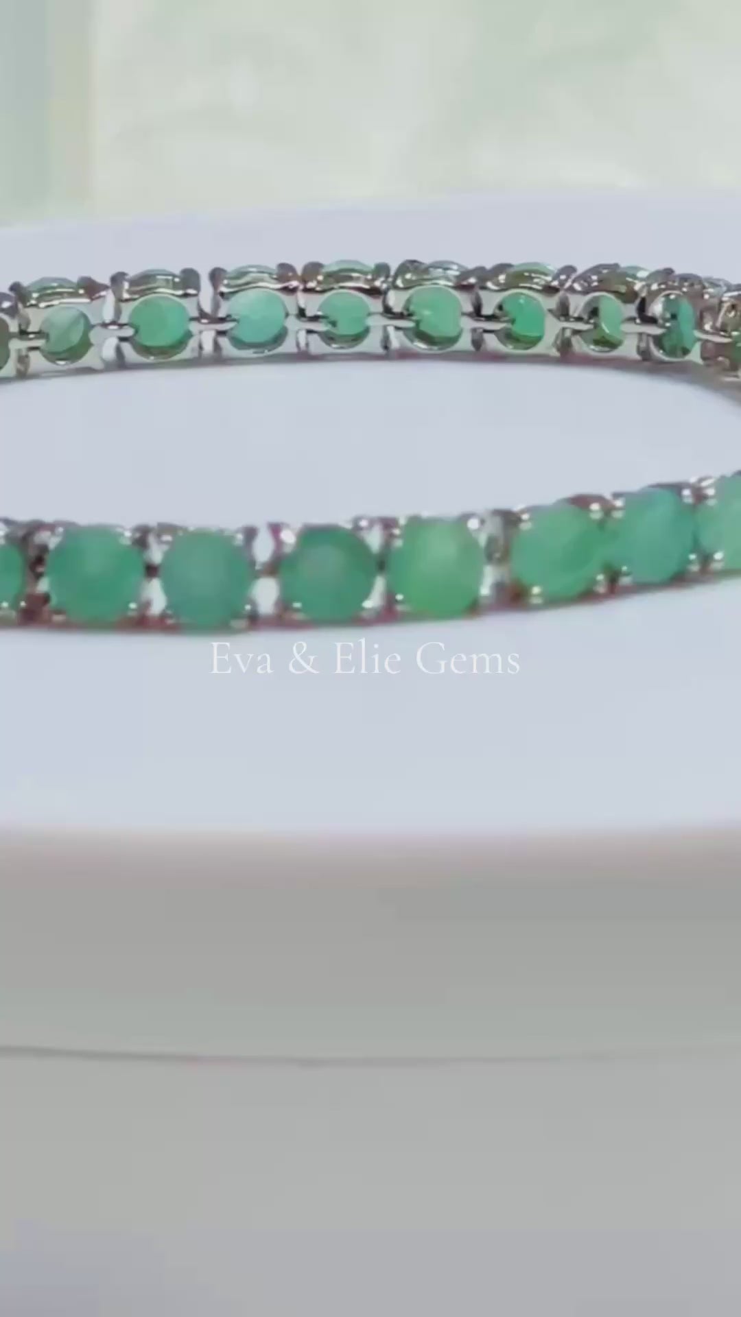 Luxurious 11CT natural round emerald tennis bracelet in gold, a perfect statement piece.
