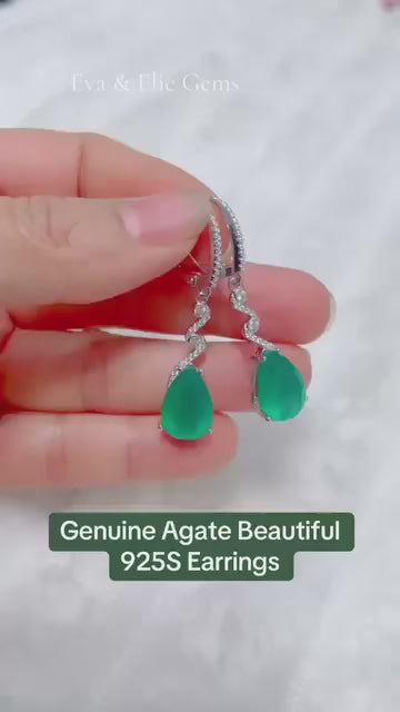 These stunning earrings feature genuine green agate stones set in sterling silver.
