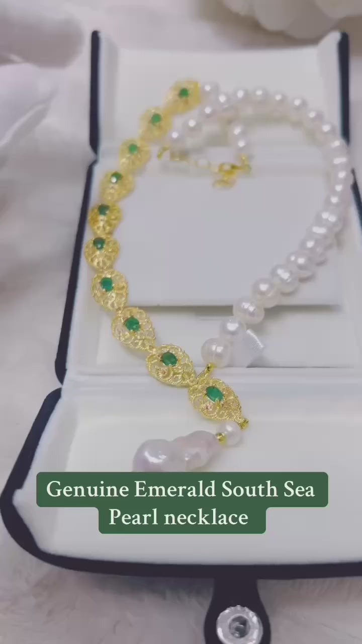 Genuine emerald and South Sea pearl necklace with gold-toned accents.
