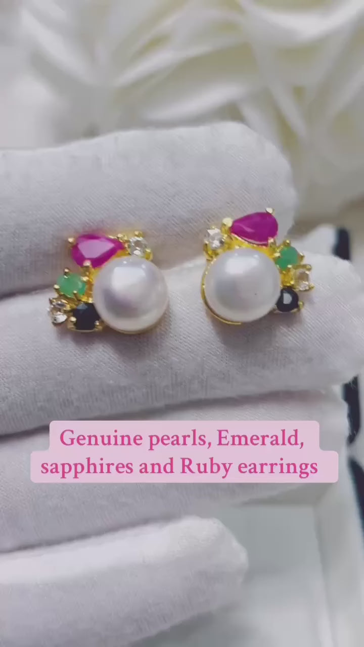  Genuine South Sea pearl earrings with emeralds, rubies, and sapphires.