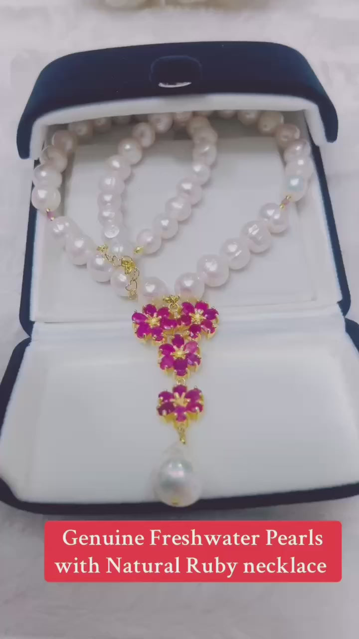  Exquisite natural freshwater pearl and ruby drop necklace. Timeless elegance.