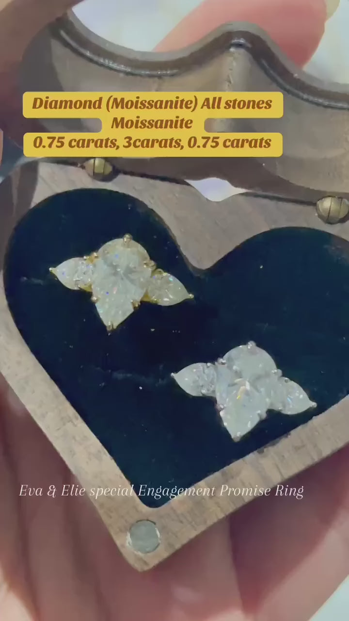 Beautiful moissanite two-stone ring with pear-shaped diamonds/moissanites, set in gold sterling.