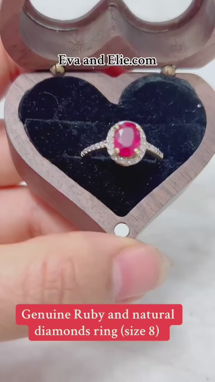 Genuine ruby and natural diamond ring in sterling silver.