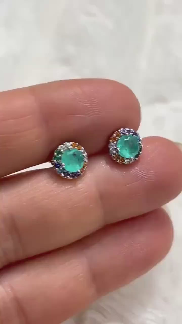 Vibrant Paraiba tourmaline stud earrings with a dazzling multi-gemstone halo, perfect for everyday elegance.