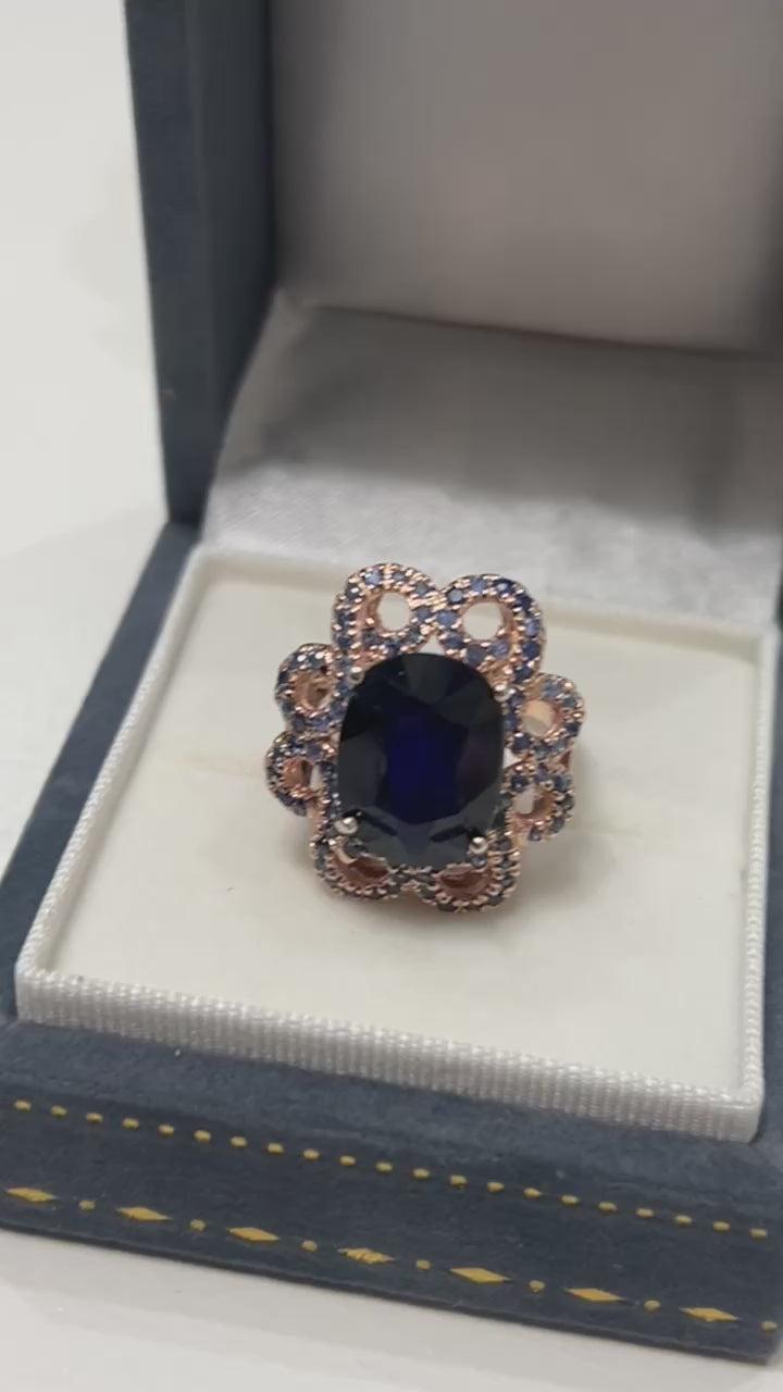 Oval Blue Sapphire Floral Ring with Rose Gold embraced Sterling silver