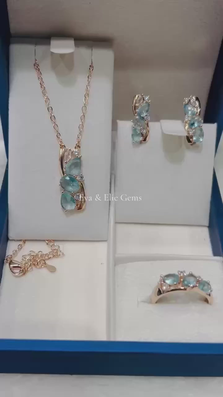 Complete aquamarine jewelry set: necklace, earrings, and ring. Perfect for gifting.