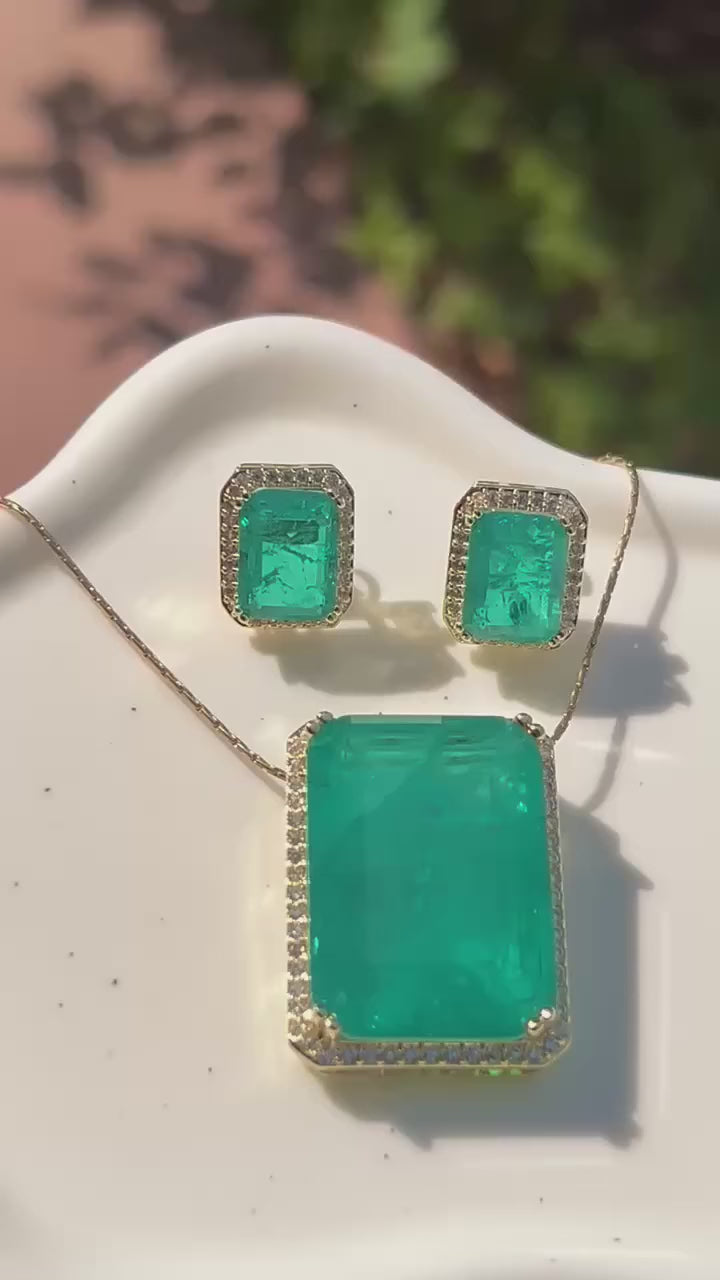 Genuine Zambian emerald doublet pendant and matching earrings set.