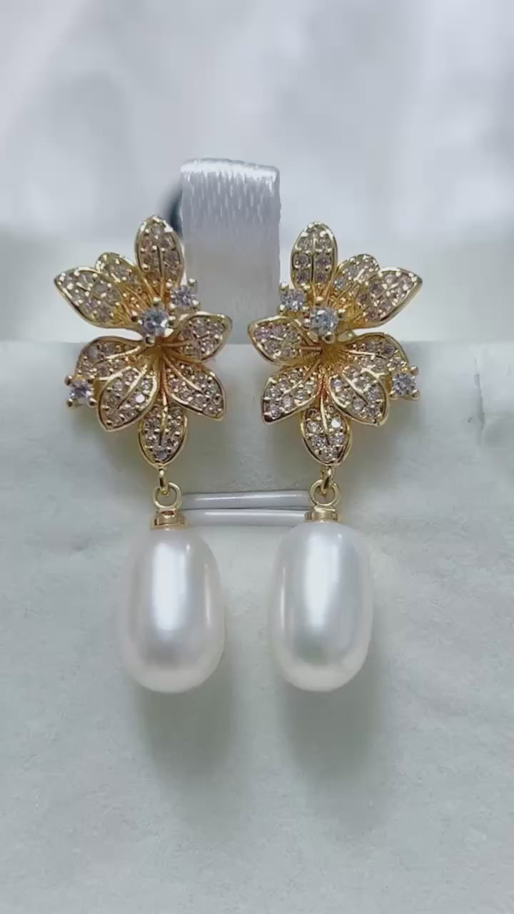 Sterling silver gold vermeil natural pearl drop earrings with floral sparkle.