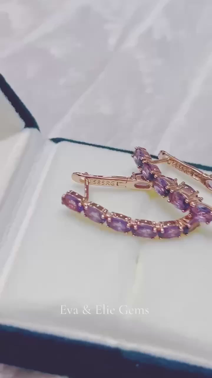 Dazzling marquise amethyst hoop earrings in 14k 585RG. A vibrant purple statement.