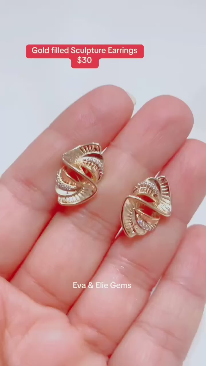  Elegant rose gold-filled sculptural earrings by Eva & Elie Gems. Modern & stylish.