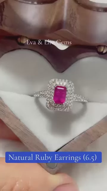 A stunning natural ruby ring with a double halo of sparkling stones