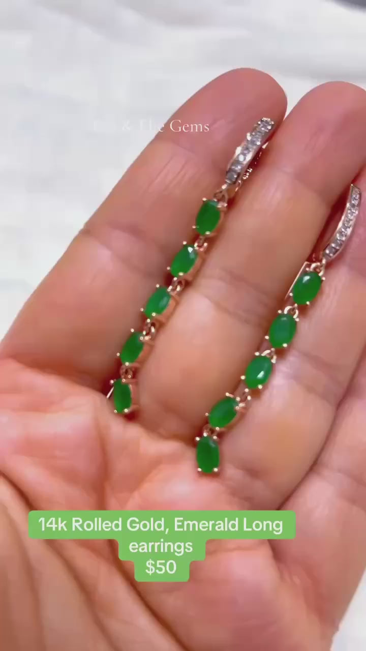  Long, fancy emerald earrings in 14k rolled gold, perfect for an evening out.