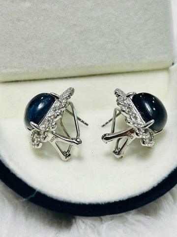 Side profile of raw blue sapphire earrings, showcasing the earring posts, backs, and 'S925' sterling silver mark.