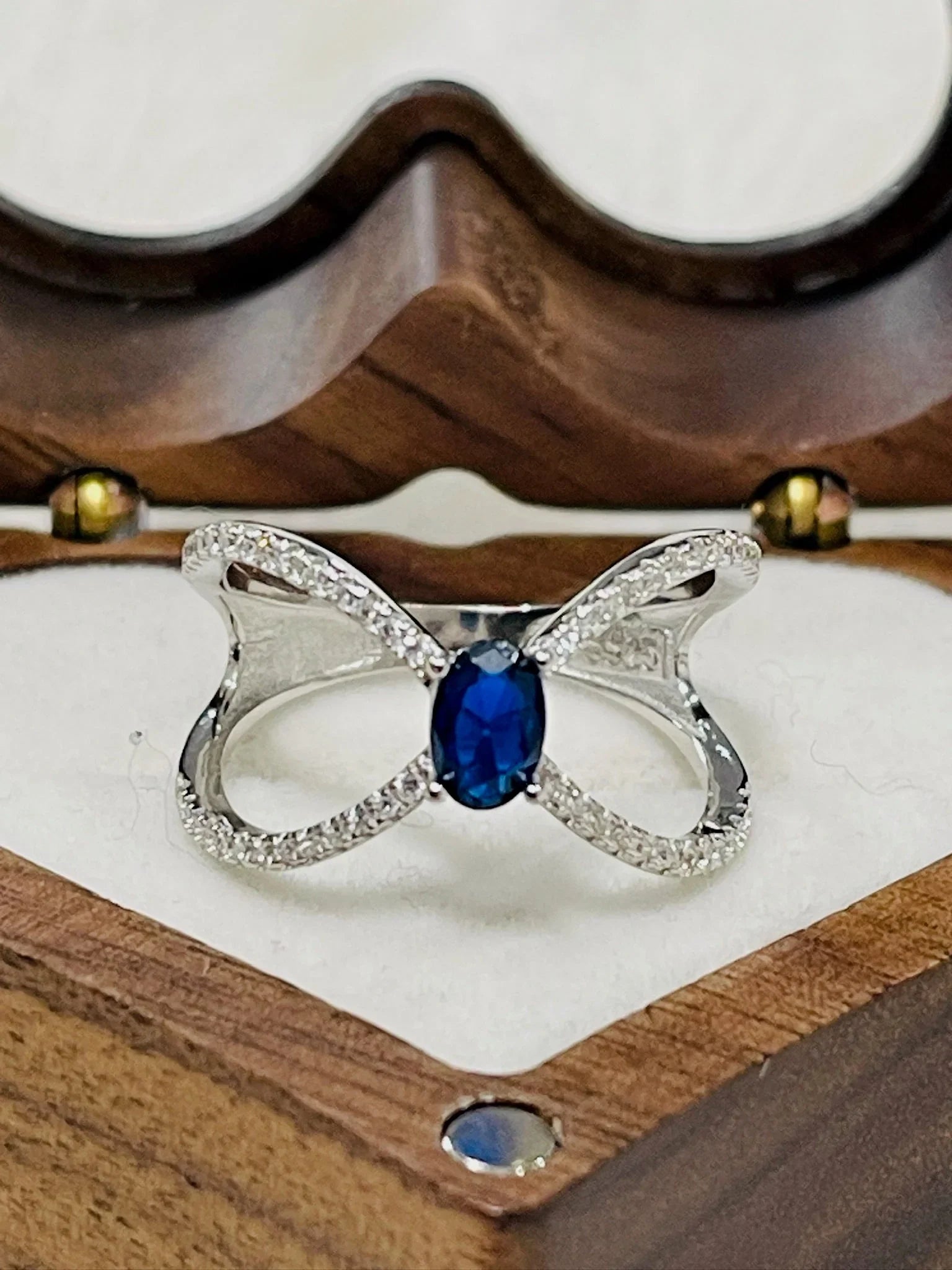 Infinity Style Sapphire Ring by Eva & Elie.
