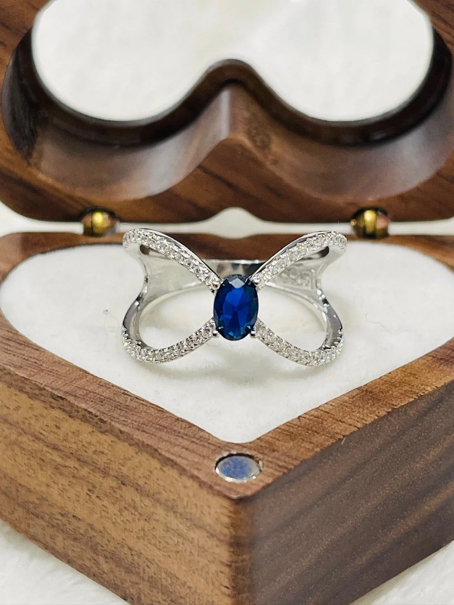 Infinity Style Sapphire Ring by Eva & Elie.