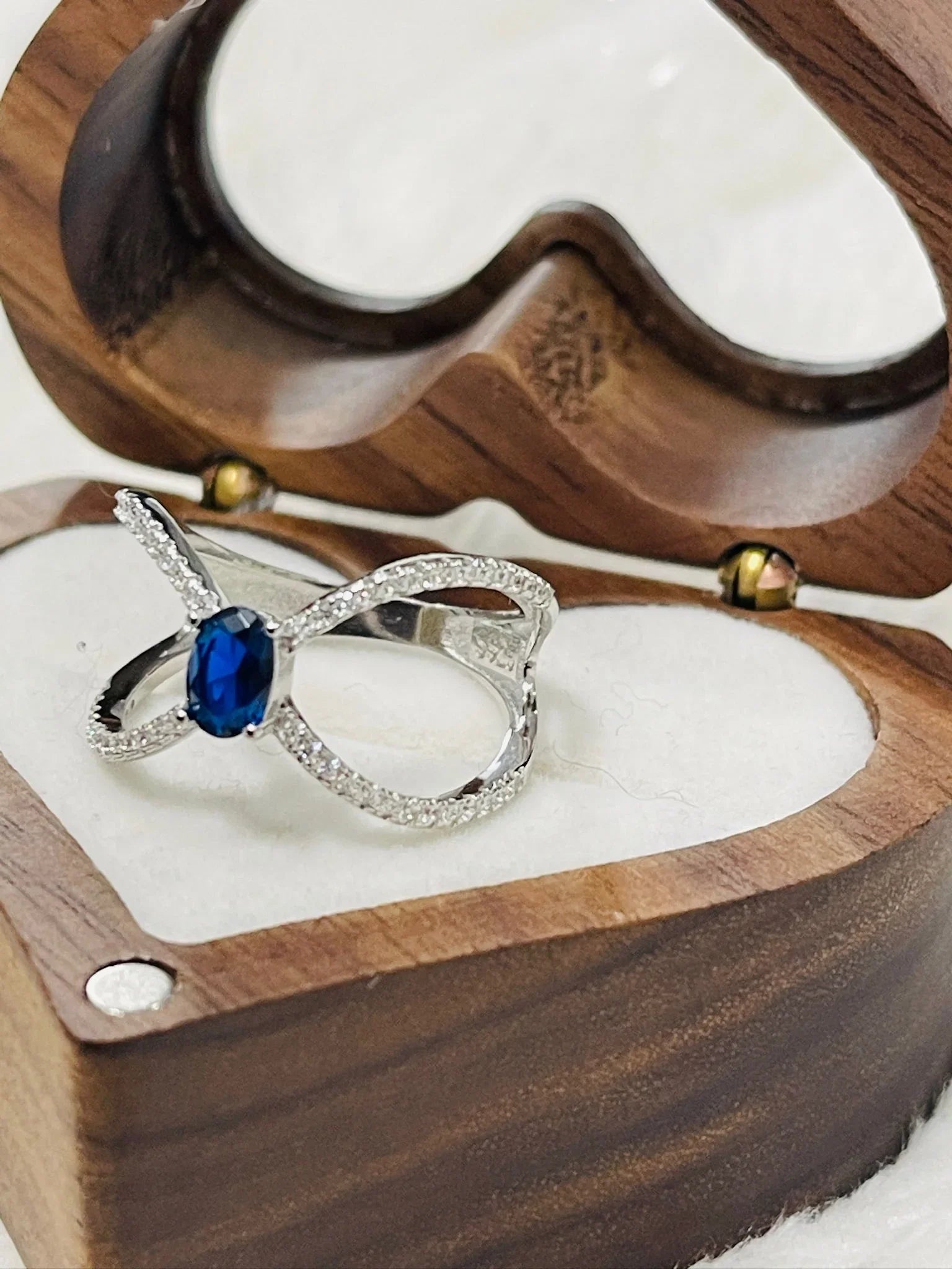 Infinity Style Sapphire Ring by Eva & Elie.