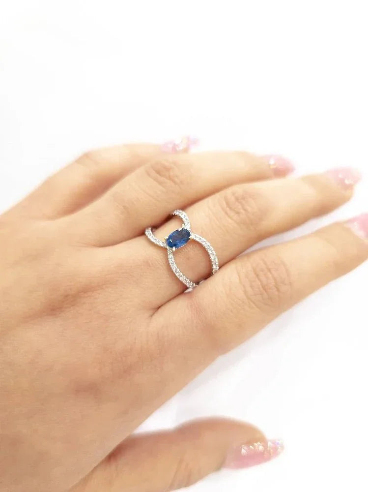 Infinity Style Sapphire Ring by Eva & Elie.