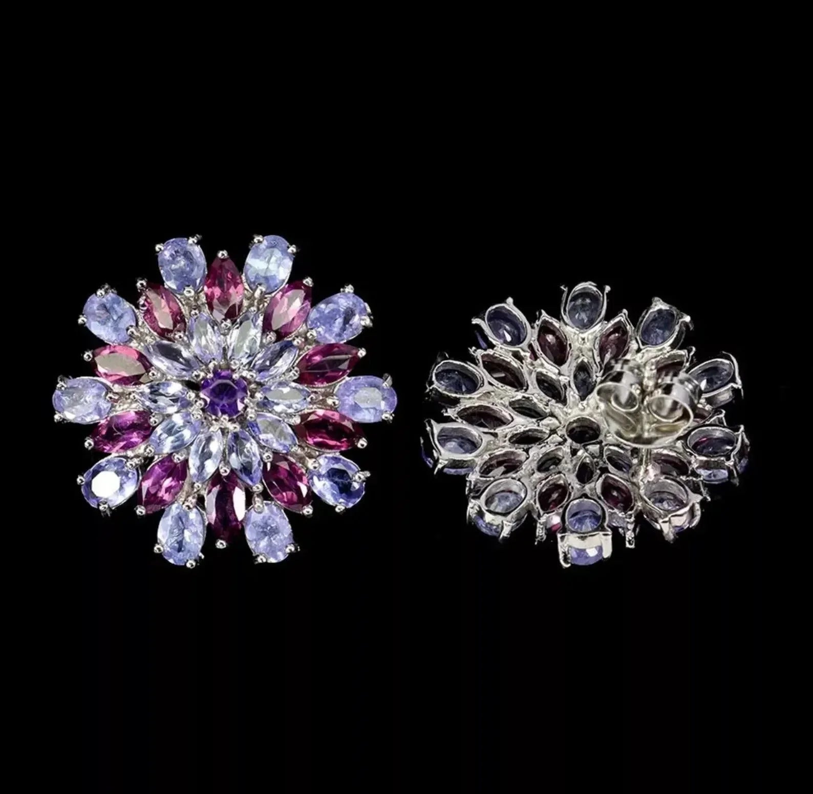 Front and back view of tanzanite and rhodolite sunburst earrings, illustrating the gem settings and secure closures.