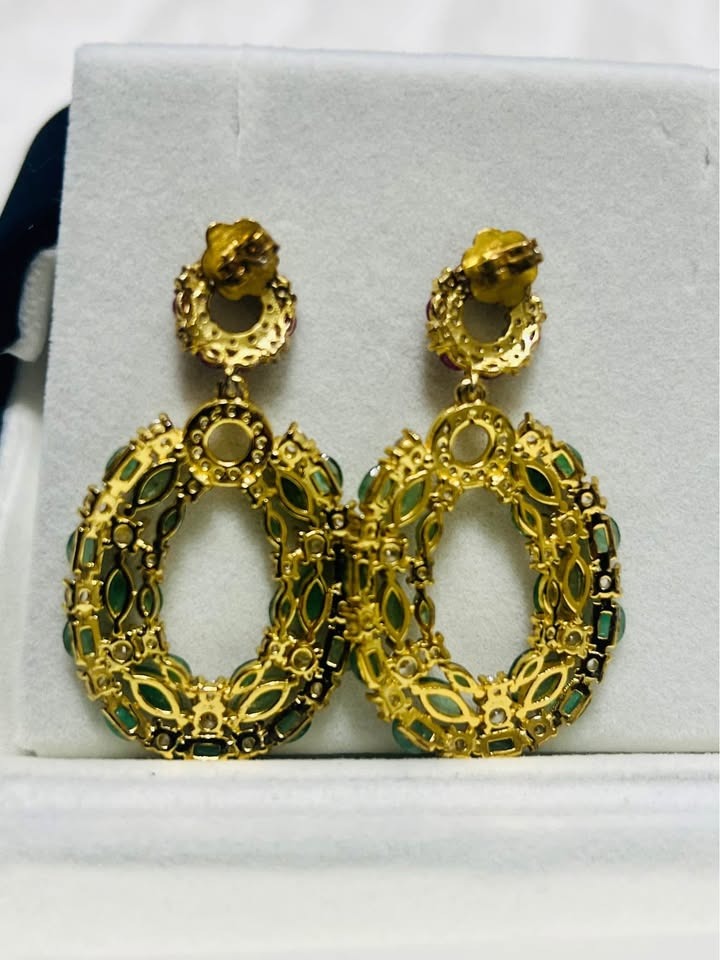 Back view of vintage natural emerald and ruby earrings, showing detailed gold-tone finish.