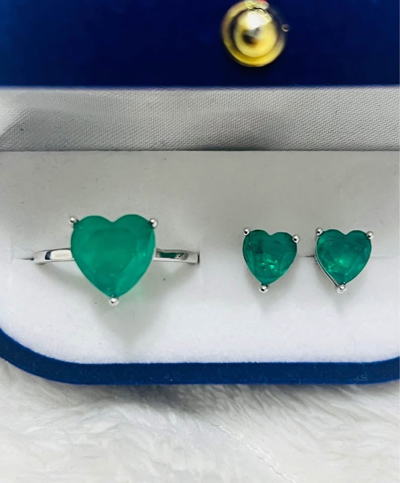 Dainty heart-shaped Zambian emerald earrings and ring set in polished sterling silver.